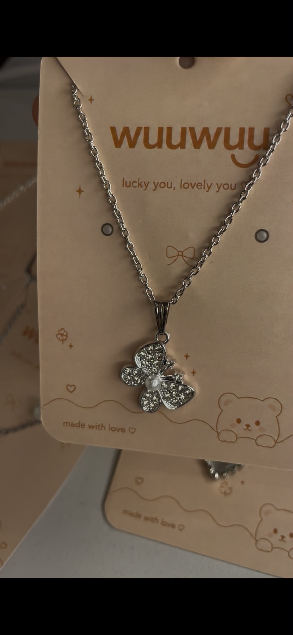 Crystal butterfly pendant necklace on Wuuwuu branded card