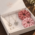 Wuuwuu gift box open with necklace earrings and scrunchies