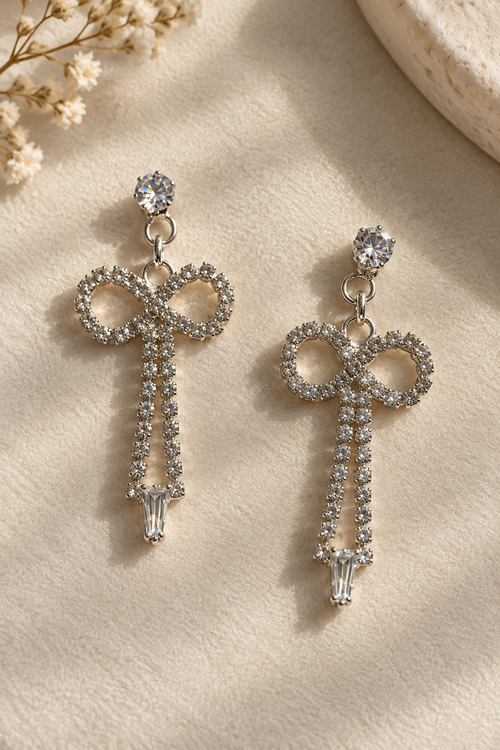 Crystal rhinestone bow drop earrings product shot